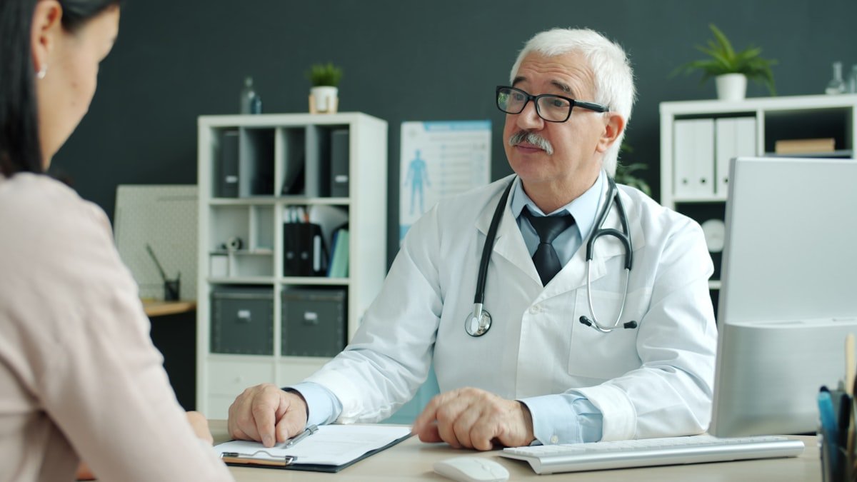 Doctor consulting with a patient at Ravi Hospital